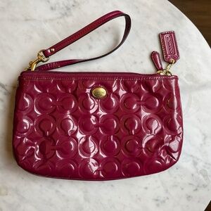 Coach fucschia patent wristlet, 9 x 5.5 in.